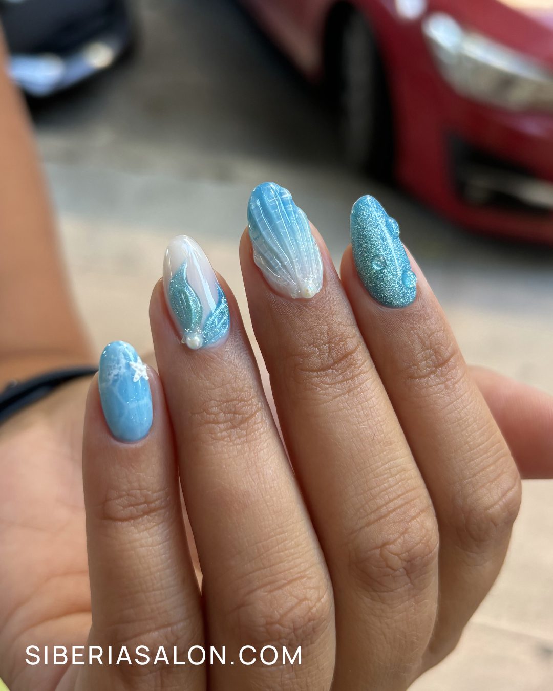 Uñas con conchas marinas en efecto 3D